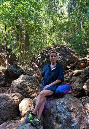 18 year old female Doris G slips off her underwear to pose naked on her bed